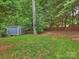A backyard featuring a storage shed at 314 Southern Cross Ln, Matthews, NC 28105