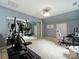 Spacious exercise room with large mirror and desk setup at 314 Southern Cross Ln, Matthews, NC 28105