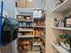 Well-organized pantry with ample shelving, baskets, and storage solutions for all your culinary needs at 314 Southern Cross Ln, Matthews, NC 28105