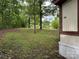 Side exterior view of the manufactured home with address number 115 on the side of the home at 326 Havencrest Ct, Gastonia, NC 28052