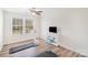 Bright bedroom features hardwood floors, and a ceiling fan at 3326 Park South Station Blvd, Charlotte, NC 28210