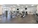 Well-equipped exercise room with modern machines and a clean, spacious layout and natural light at 3326 Park South Station Blvd, Charlotte, NC 28210