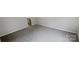 Bedroom featuring neutral carpeting, base trim and paint with views of the doorway to the hallway at 4122 Munson Dr, Charlotte, NC 28215