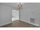Open dining area with views into other living spaces and stylish modern lighting at 4315 Gibbon Rd, Charlotte, NC 28269
