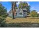 Charming home with a blue deck and traditional architectural details at 4315 Gibbon Rd, Charlotte, NC 28269