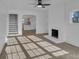 Bright living room showcasing a fireplace and seamless access to the kitchen at 4315 Gibbon Rd, Charlotte, NC 28269