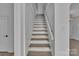 Bright stairway showcasing modern design and natural light flowing into the space at 4315 Gibbon Rd, Charlotte, NC 28269