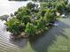 Picturesque waterfront property with lush greenery, private docks, and stunning lake views at 4681 Dove Point Ln, York, SC 29745