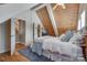Comfortable bedroom features an angular wood ceiling, a plush rug, and a TV at 4681 Dove Point Ln, York, SC 29745