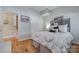 Comfortable bedroom features a decorative headboard and a closet with double doors at 4681 Dove Point Ln, York, SC 29745