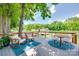 Inviting outdoor deck featuring rocking chairs and dining set, with scenic lake views at 4681 Dove Point Ln, York, SC 29745