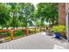 Spacious deck with scenic water view, wooden railing, and cozy seating area; the perfect outdoor escape at 4681 Dove Point Ln, York, SC 29745
