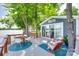 Cozy deck with lake view, outdoor seating, and inviting ambiance, perfect for lakeside relaxation at 4681 Dove Point Ln, York, SC 29745