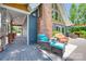 Inviting outdoor space with comfortable seating and a stunning brick fireplace, perfect for relaxation at 4681 Dove Point Ln, York, SC 29745