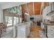 Spacious open kitchen with vaulted ceilings, breakfast bar, and seamless flow into the living area at 4681 Dove Point Ln, York, SC 29745
