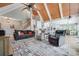 Open living room with vaulted ceilings, staircase, and kitchen area featuring lots of natural light at 4681 Dove Point Ln, York, SC 29745