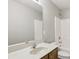 Bathroom featuring a single vanity, toilet, and shower over bath at 5002 Abode Lily Ln, Charlotte, NC 28227