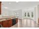 Open kitchen features stainless steel appliances, granite countertops and open floorplan at 5002 Abode Lily Ln, Charlotte, NC 28227