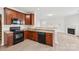 Well appointed kitchen has granite countertops and stainless steel appliances at 5002 Abode Lily Ln, Charlotte, NC 28227