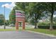 Prominent sign showcasing various businesses at Albemarle Crossing, offering shopping and dining options at 5002 Abode Lily Ln, Charlotte, NC 28227