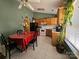 Bright eat-in kitchen area featuring classic cabinets, and tile flooring at 501 N Johnson St, Monroe, NC 28112