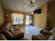 Open concept living area with tile floors, natural light, and comfortable seating at 501 N Johnson St, Monroe, NC 28112