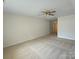 Open bedroom featuring plush carpeting, with a view towards the doorway at 509 Settlers Grove Ln, Salisbury, NC 28146