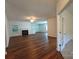 Open-concept living room with hardwood floors, fireplace, and natural light at 509 Settlers Grove Ln, Salisbury, NC 28146