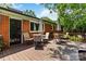 Outdoor deck area furnished with multiple tables and chairs, great for entertaining at 5111 Tewkesbury Rd, Charlotte, NC 28269