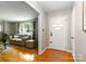 Bright and airy living room showcasing hardwood floors and neutral decor at 5111 Tewkesbury Rd, Charlotte, NC 28269