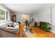 Cozy living room with hardwood floors, fireplace, and comfortable seating area at 5111 Tewkesbury Rd, Charlotte, NC 28269