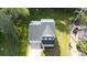 Aerial view of home, showing roof, driveway, and partial yard at 512 Beverly Cir, Charlotte, NC 28270