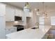 Gourmet kitchen featuring stainless appliances, quartz counters and ample cabinet space at 512 Beverly Cir, Charlotte, NC 28270