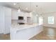 Spacious kitchen with stainless steel appliances, quartz countertops, and pendant lighting at 512 Beverly Cir, Charlotte, NC 28270