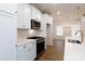 Gourmet kitchen featuring stainless appliances, quartz counters and ample cabinet space at 512 Beverly Cir, Charlotte, NC 28270