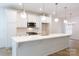 Gourmet kitchen with stainless appliances, gas range, and a large center island with bar seating at 512 Beverly Cir, Charlotte, NC 28270