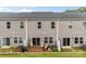 A multi-unit backyard with decks, plantings, and siding at 524 Tayberry Ln, Fort Mill, SC 29715