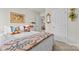 Comfortable bedroom leading into the en suite bathroom and decorated with paintings at 524 Tayberry Ln, Fort Mill, SC 29715