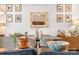 Modern dining room featuring a black table, neutral chairs, and stylish decor at 524 Tayberry Ln, Fort Mill, SC 29715
