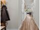 Hallway view shows seamless transition from the front to the living area, with wood floors at 524 Tayberry Ln, Fort Mill, SC 29715