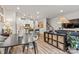 Bright open-concept living space connecting the dining area, living room, and modern kitchen at 524 Tayberry Ln, Fort Mill, SC 29715