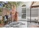 Outdoor patio with brick fireplace and grill perfect for outdoor dining at 5400 Groveton Ct, Charlotte, NC 28269
