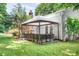 Enjoy outdoor living on this home's shaded patio featuring a outdoor living area, great for entertaining at 5400 Groveton Ct, Charlotte, NC 28269