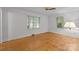 Bedroom showcasing hardwood floors, and plenty of natural light at 6207 Robinson Church Rd, Charlotte, NC 28215