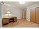 Bedroom featuring hardwood floors, a window, and a side table with lamp at 6207 Robinson Church Rd, Charlotte, NC 28215