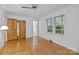 Bedroom featuring hardwood floors, closet, neutral paint, and natural light at 6207 Robinson Church Rd, Charlotte, NC 28215