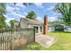Backyard features a fenced yard, patio, and nice landscaping at 706 Hammermill Ct, Charlotte, NC 28270