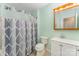 Bathroom featuring updated vanity, toilet, and shower at 706 Hammermill Ct, Charlotte, NC 28270