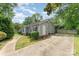 This home has a spacious driveway, and a simple landscape at 706 Hammermill Ct, Charlotte, NC 28270