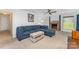 Bright living room features a brick fireplace, plush seating, and stylish decor at 706 Hammermill Ct, Charlotte, NC 28270